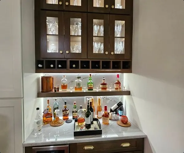 Lit bar cabinet with glass-front doors
